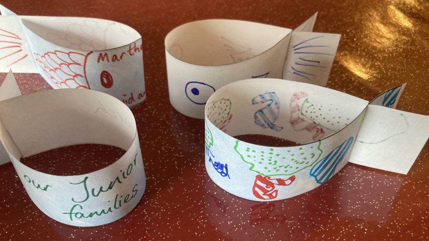Artwork and activities with people smiling
